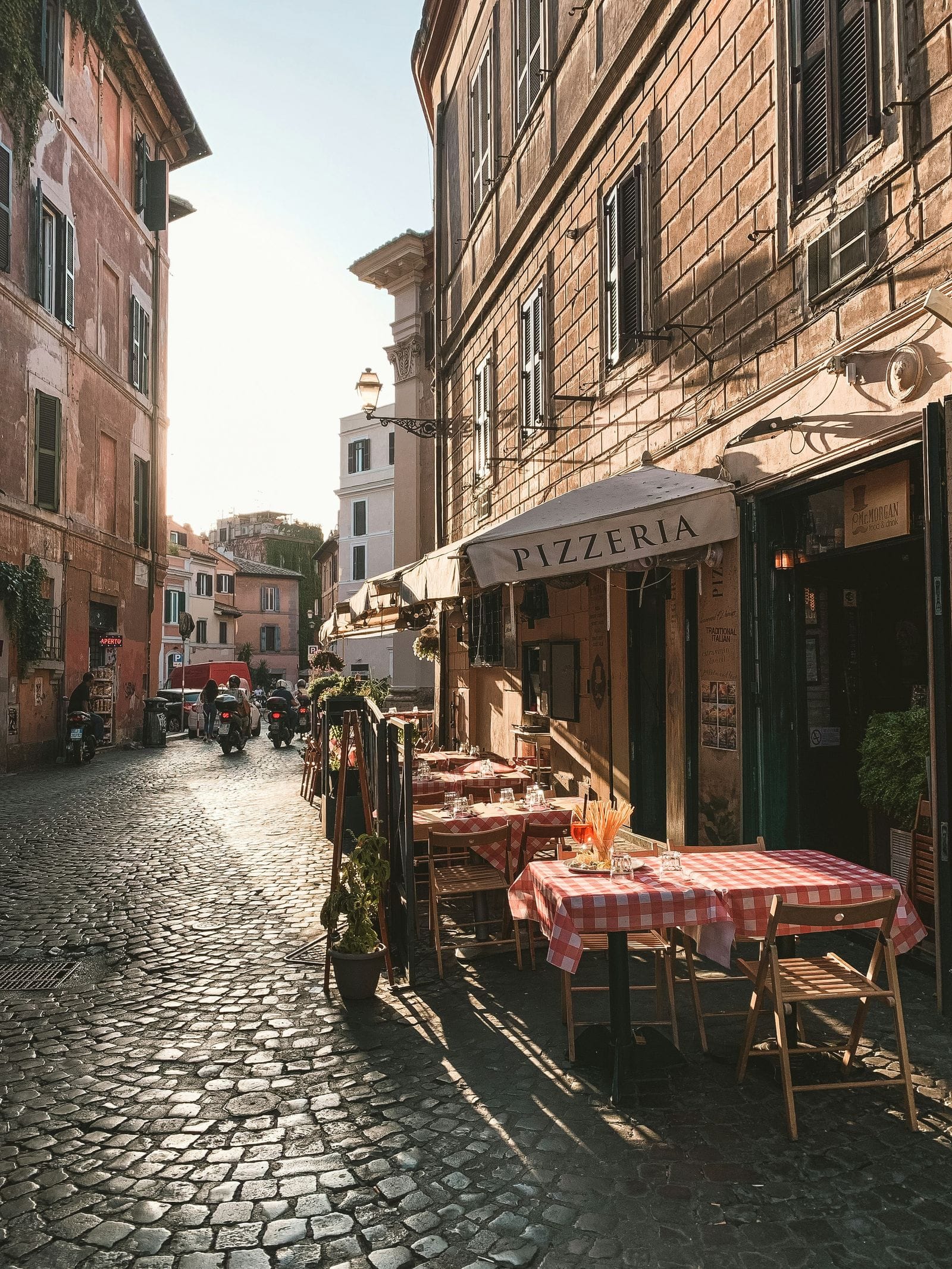 A street in Trastevere in Rome, Italy. Photo By Fineas Anton on Unsplash.